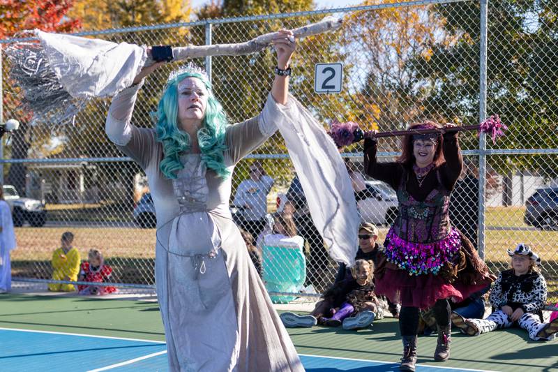 The “Hocus Pocus Hags” dance at the annual trick or treat at Washington park on Saturday, October 26, 2024 in Peru.