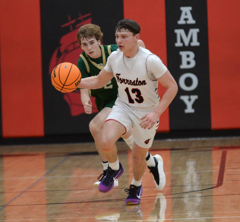 Forreston's Kendall Erdmann (13) pushes the ball up the court against  Peru St. Bede on Wednesday, Feb. 26, 2025 at the 1A Amboy Regional at Amboy High School. Erdmann scored 25 points in the Cardinals' 67-56 win.