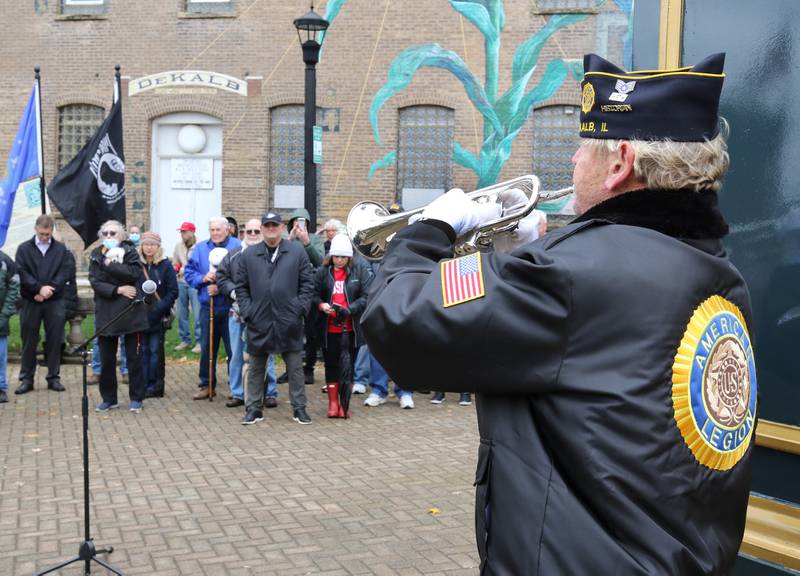 United States Air Force Veteran Michael Embry plays "Taps" Thursday, Nov. 11, 2021, during a Veterans Day and clock rededication ceremony at Memorial Park in downtown DeKalb.