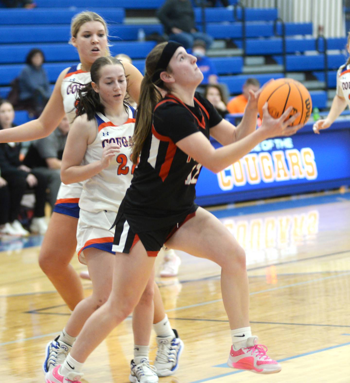 Fulton's Breleigh Hayton-Terrock (12) drives the baseline to put up a shot against Eastland during a Friday, Dec. 13, 2024 game at Eastland High School in Lanark. Terrock led the Steamers in scoring with 17 points in the 42-34 loss.