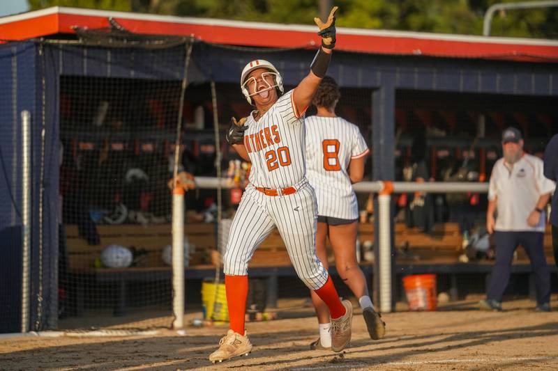 Oswego’s Jaelynn Anthony (20) reacts after hitting a homer in the bottom of the 6th inning against Minooka during a Southwest Prairie Conference softball game at Oswego High School on Wednesday, April 23, 2025.