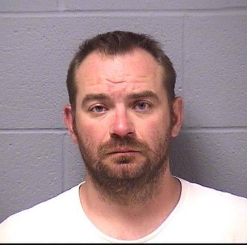 Michael Kazecki appears in a mug shot from the Will County Sheriff's Office. His wife, Rebecca, 38, died at Presence St. Joseph Medical Center shortly after 4:30 p.m. Tuesday. Michael Kazecki faces a first-degree murder charge.