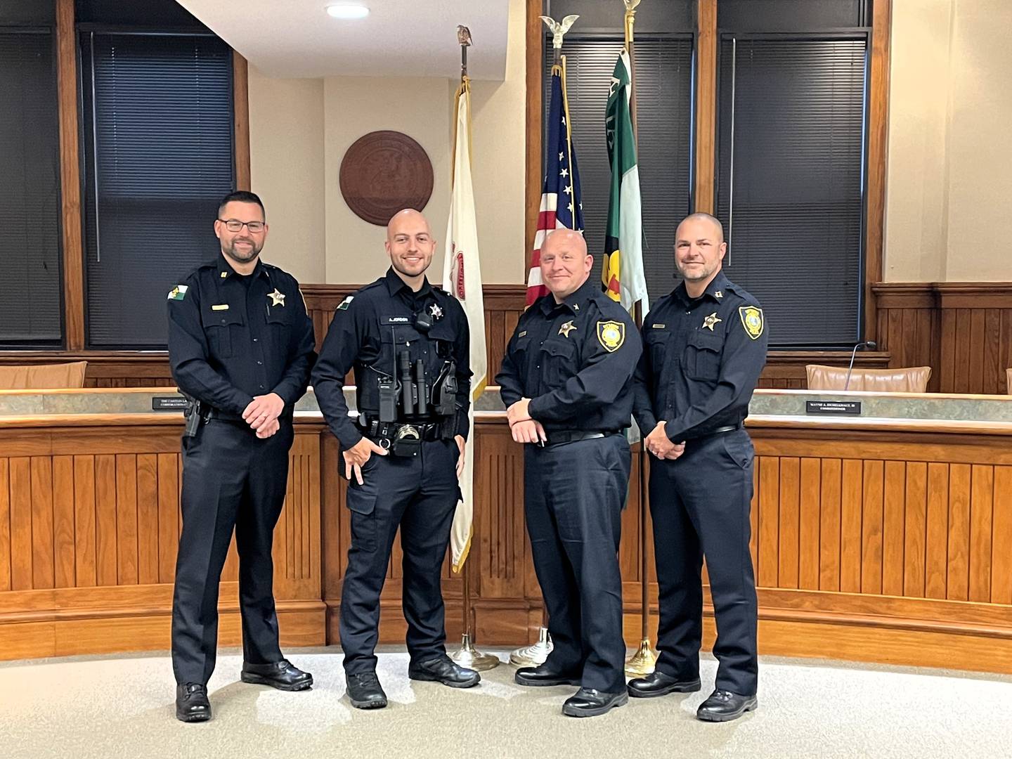 New Ottawa police officer Alex Jordon is welcomed aboard by Ottawa police administrators.