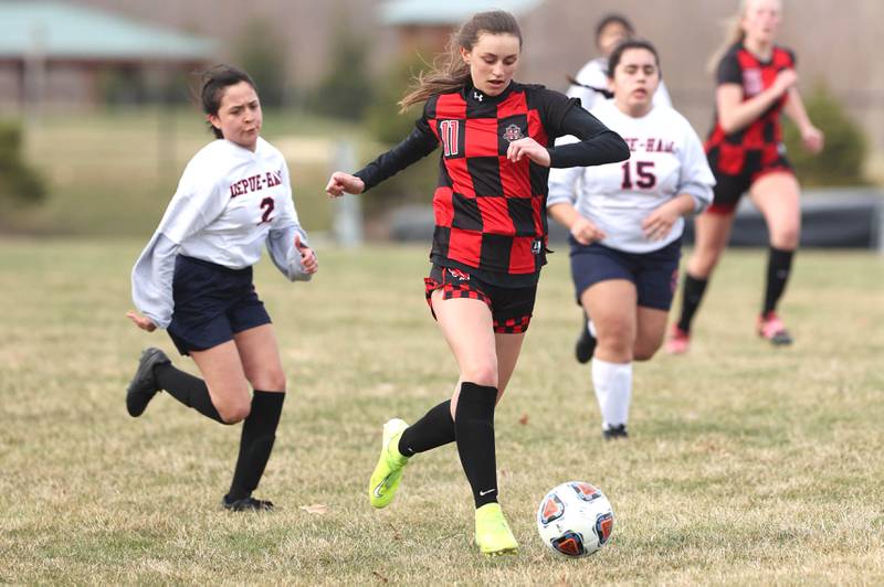 Indian Creek's Isabella Turner gets behind the DePue defense during their game Tuesday, April 5, 2022, at Indian Creek Middle School in Waterman.