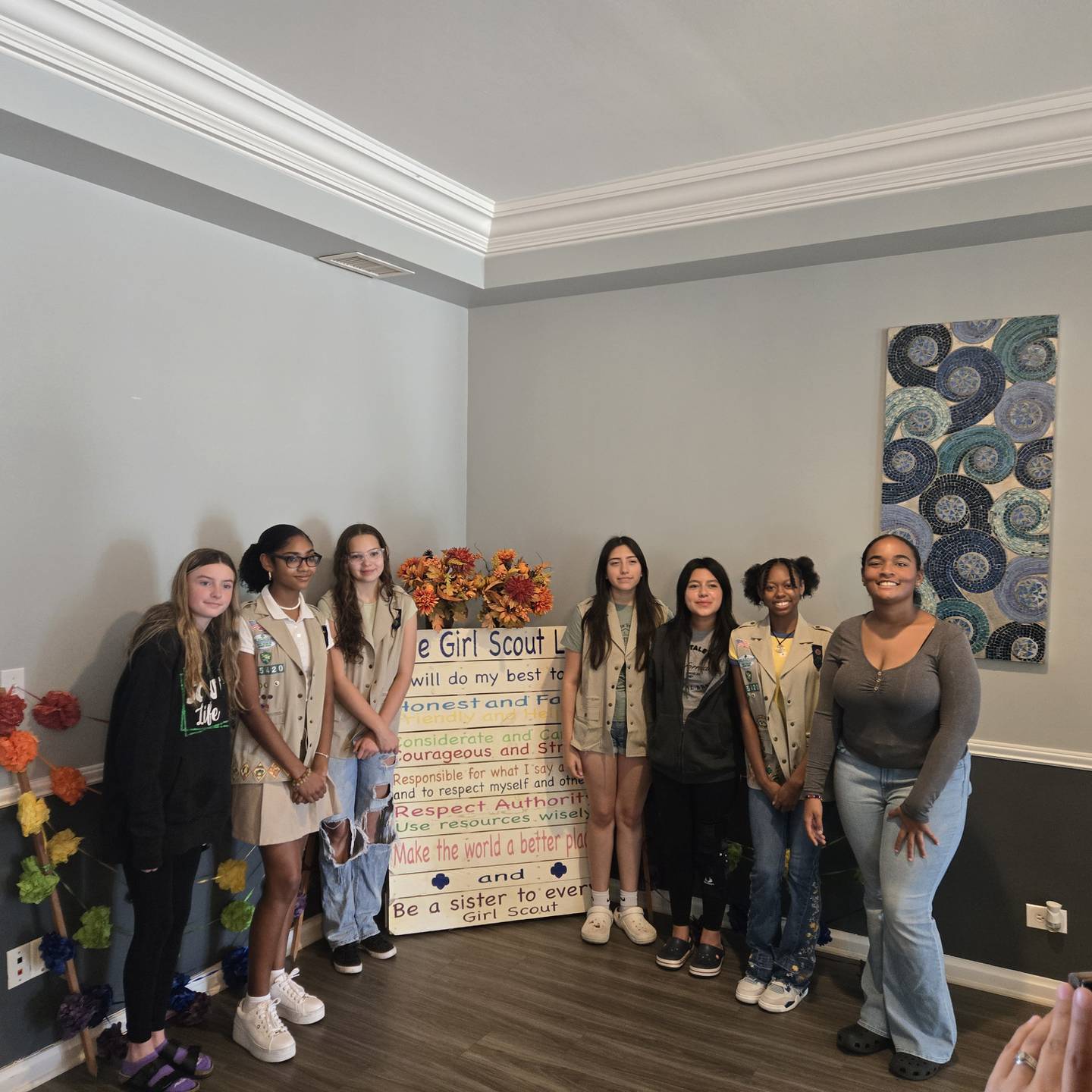 Troop members at the bridging ceremony to receive their Silver Award. From left are Jaclyn Sauser (Lakemoor), Samiya McBean (Round Lake), Andrea Dewitt (Crystal Lake), Alexis Briseno (Crystal Lake), Rachel Rodriguez (Lakemoor), Caelyn McDaniel (Volo) and Raiann-Nalani Brown (Round Lake), who were all eighth graders at the time of the project's end date.