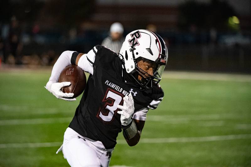 Plainfield North's Darin Ashiru runs the ball during a game against Joliet West Friday Sept. 20, 2024 at Plainfield North High School