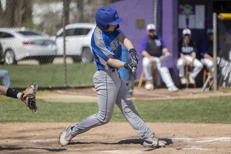 Newman’s Ashton Miner drives in two on this swing against Dixon Saturday, April 13, 2024 at Veterans Memorial Park in Dixon.