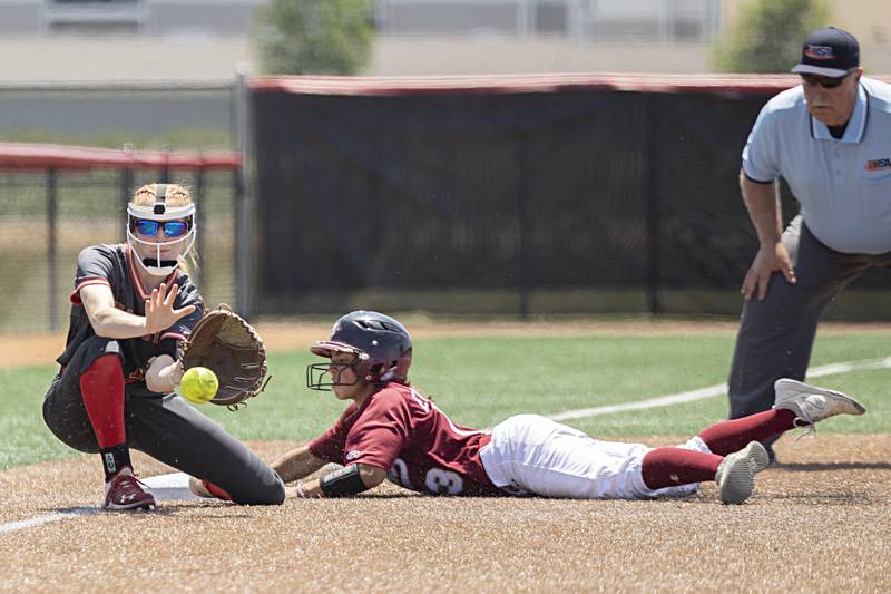 Antioch’s Eden Echevarria slides in safely at third against Charleston Friday, June 9, 2023 in the class 3A state softball semifinal.