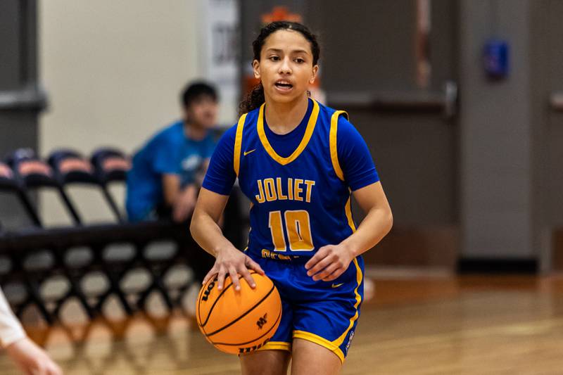 Joliet Central's Elena Moody looks down court during a WJOL Girls Basketball Tournament game against Minooka at Minooka on Nov. 19, 2025
