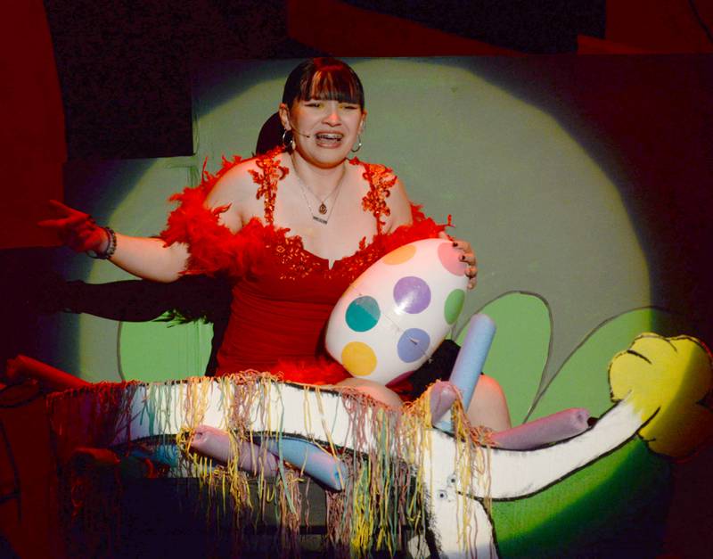 Oregon High School Sophomore Bethany Reed sings as Mayzie la Bird as she sits in her nest with her egg during the school's presentation of "Seussical The Musical" on Friday, March 14, 2025 in the OHS Theater.
