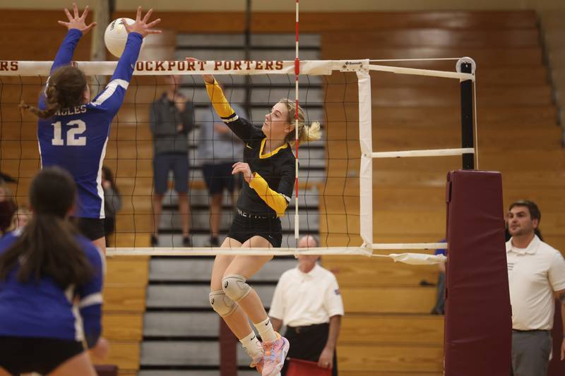 Joliet West’s Ava Grevengoed powers a shot down the line against Sandburg in the in the Class 4A Lockport Sectional title match on Wednesday.