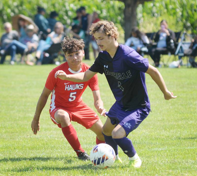 Rochelle's Eliud Lombardia (4) and Oregon's Ivan Hernandez (5) battle for the ball on Saturday, Aug. 30, 2025 at the Oregon-Stillman Varsity Soccer Tourney at Oregon Park West.