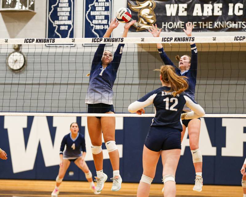 Nazareth's Olivia Austin (7) leaps high for the block during volleyball match between Nazareth at IC Catholic Prep.  Aug 29, 2023.