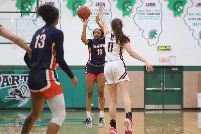 Romeoville’s Jaylen Zachary puts up the three-point shot against Lockport in the Oak Lawn Holiday Tournament championship on Saturday, Dec.16th in Oak Lawn.