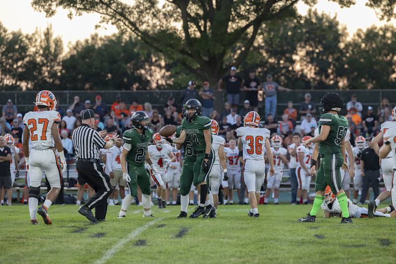 Rock Falls’ Logan Thome recovers a fumble against Byron Thursday, August 28, 2025.