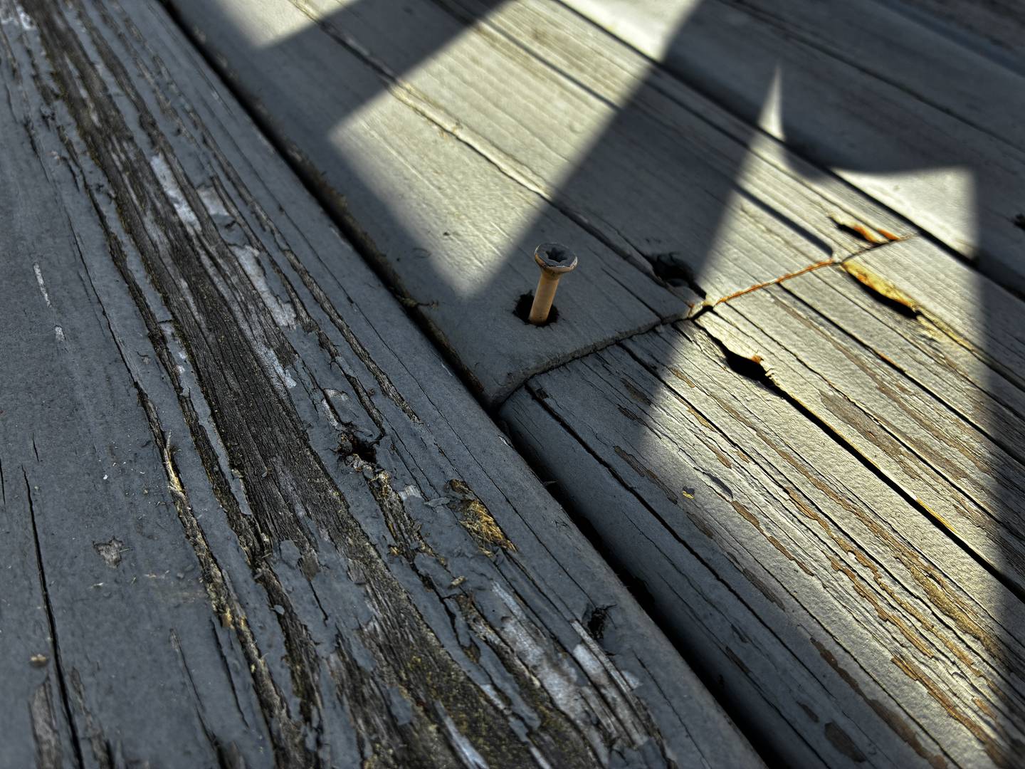 One of the screws that has popped up on U.S. Marine Corps veteran Luke McArthur's deck, on Thursday, Oct. 30, 2025. His McHenry home is getting some much needed work thanks to 30 Days for 30 Vets, now in its second year.