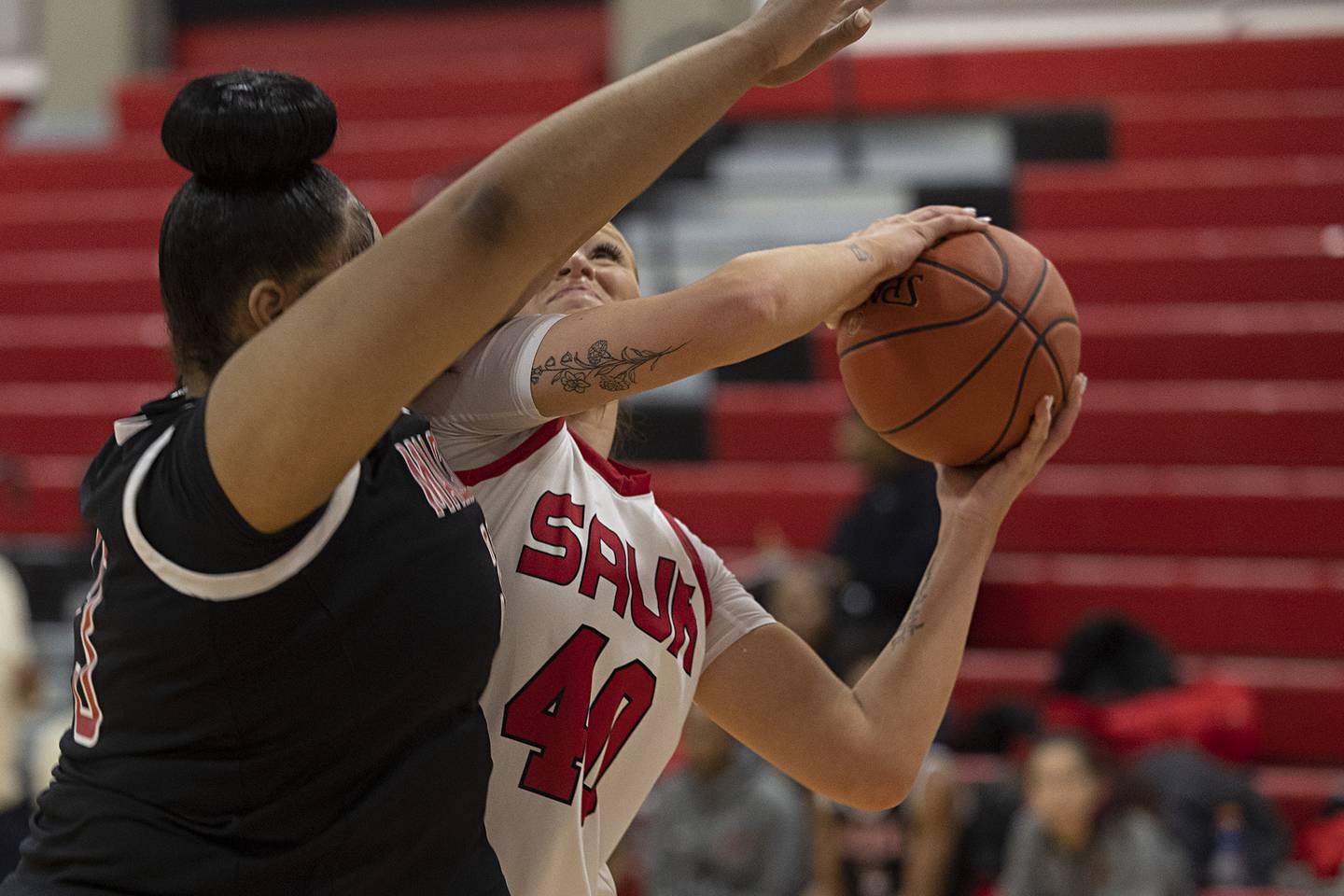 SVCC’s Camryn Veltrop works below the basket against Malcom X’s Christin Brewer Monday, Feb. 23, 2026.