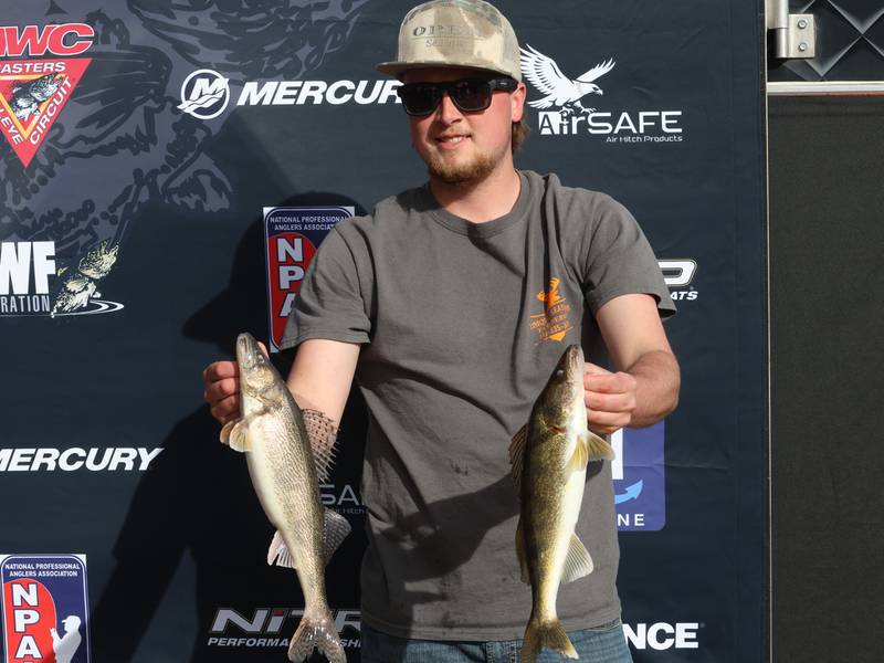 Drake Doucette of Bureau, holds up his fish that he caught during the annual Masters Walleye Circuit tournament on Friday, March 20, 2026 at the Spring Valley Boat Club.