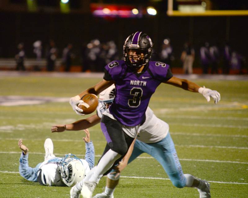 Downers Grove North's Ethan Thulin makes his way close to the end zone during their home game against Willowbrook Friday Sept. 3, 2021.