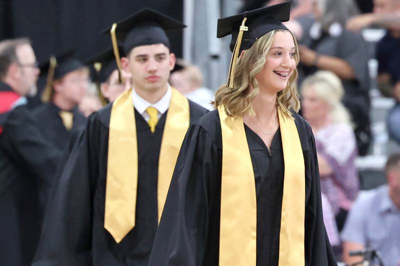 Graduation candidates head to their seats during commencement ceremonies Sunday, May 28, 2023, at Sycamore High School.