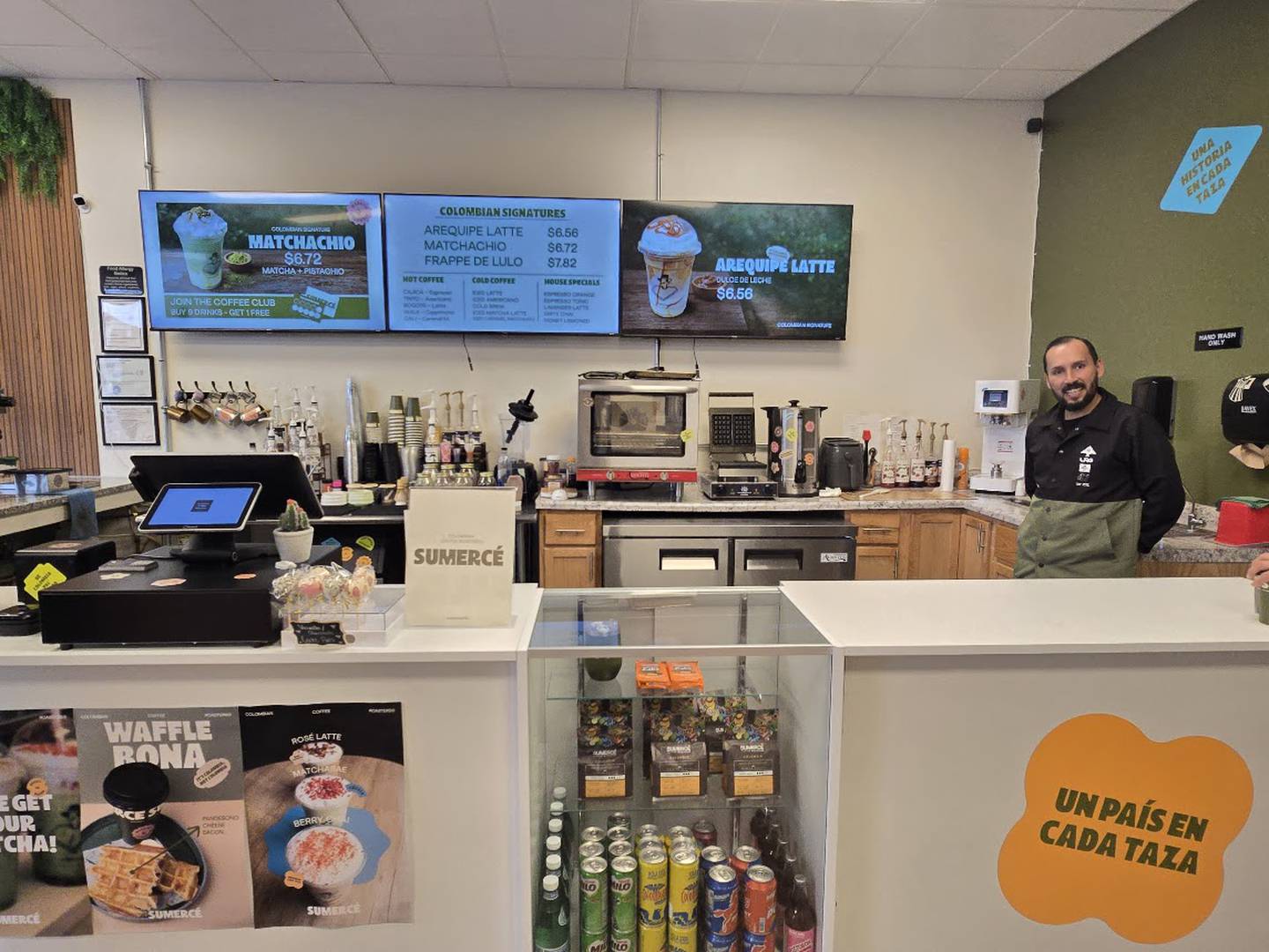 Andrés Reyes García, who with his wife Paula Naranjo opened Sumercé Colombian Coffee Roasters  in Crest Hill on Feb. 2, 2025, is seen behind the counter of his coffee shop on Saturday, March 7, 2026.
