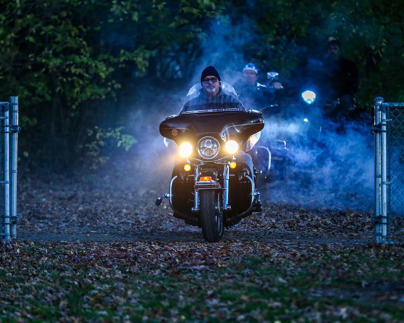 Riders on Harleys ride into the stadium, followed by the Wilmington football team during Class 2A semi-final playoff football game between Moroa-Forsyth at Wimington.  Nov 18, 2023.