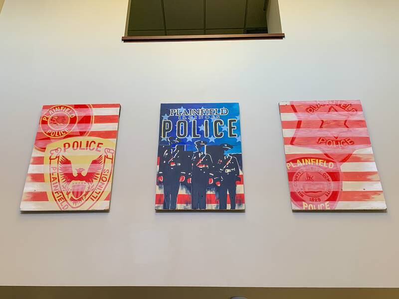 Plainfield High School-Central Campus art teacher Lindsey Brown's three-panel mural incorporates the history of the Plainfield Police Department. Brown used historical photos of the village's first police officers and old department uniform patches in her design.