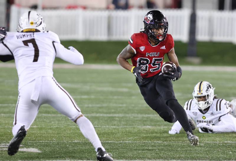 Northern Illinois' Trayvon Rudolph looks to get by Western Michigan's Anthony Romphf during their game Tuesday, Nov. 14, 2023, in Huskie Stadium at NIU in DeKalb.