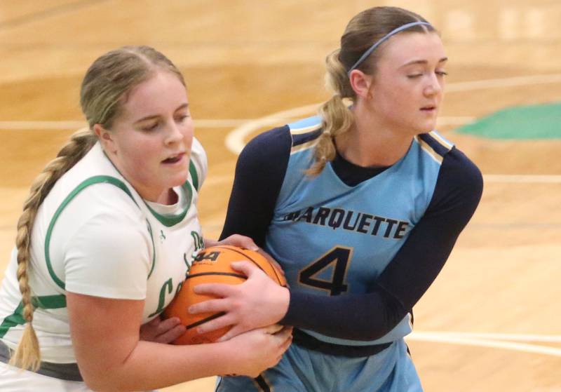 Seneca's Emma Mino forces a jump ball with Marquette's Hunter Hopkins on Thursday, Feb. 5, 2026 at Seneca High School.