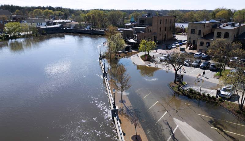The Fox River is overflowing its banks leaving portions of a West Dundee parking lot closed on Monday, Apr. 20, 2026.