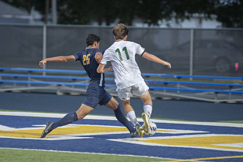 Sterling’s Felipe Sandoval and Geneseo's Matt Daly go after a ball late in the first half Tuesday, Sept. 20, 2022.
