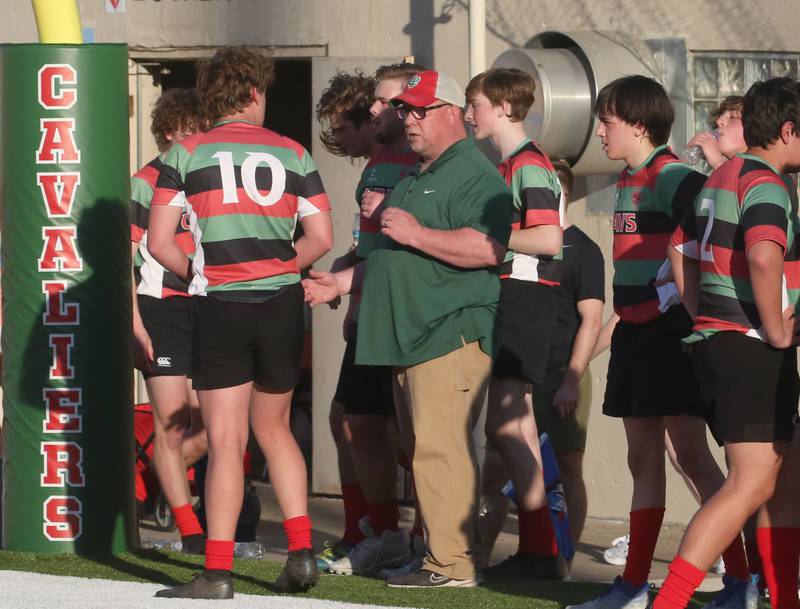 La Salle-Peru head rugby coach Fran Baker coaches his team against La Salette Academy during a rugby game on Wednesday, April 12, 2023 at Howard Fellows Stadium at L-P High School.