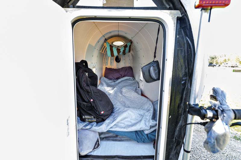 There’s just enough space for the over-6-foot Hickle to sleep in his wagon as seen Friday, Aug. 15, 2025.