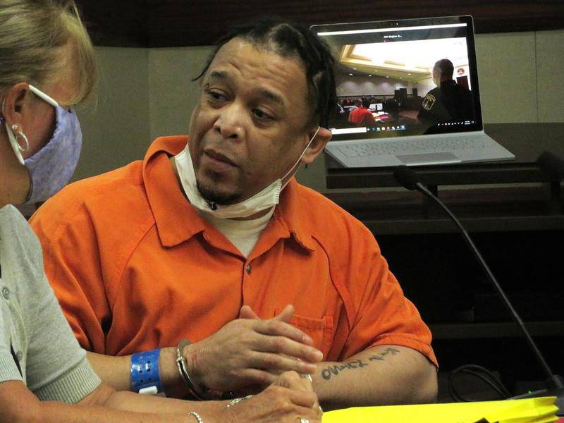Nehemiah Williams, 40, of Aurora (right) directly addresses family members and friends of former Oswego High School softball coach Amanda Stanton as lawyer Dawn Projansky (left) listens during Williams's statement made in court during his sentencing hearing on charges related to the 2018 hit-and-run death of Stanton on Monday, June 29 at the Kendall County Courthouse in Yorkville.
