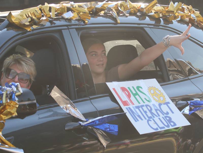 The L-P interact club passes by during the L-P homecoming parade on Thursday, Oct. 2, 2025 downtown Peru.