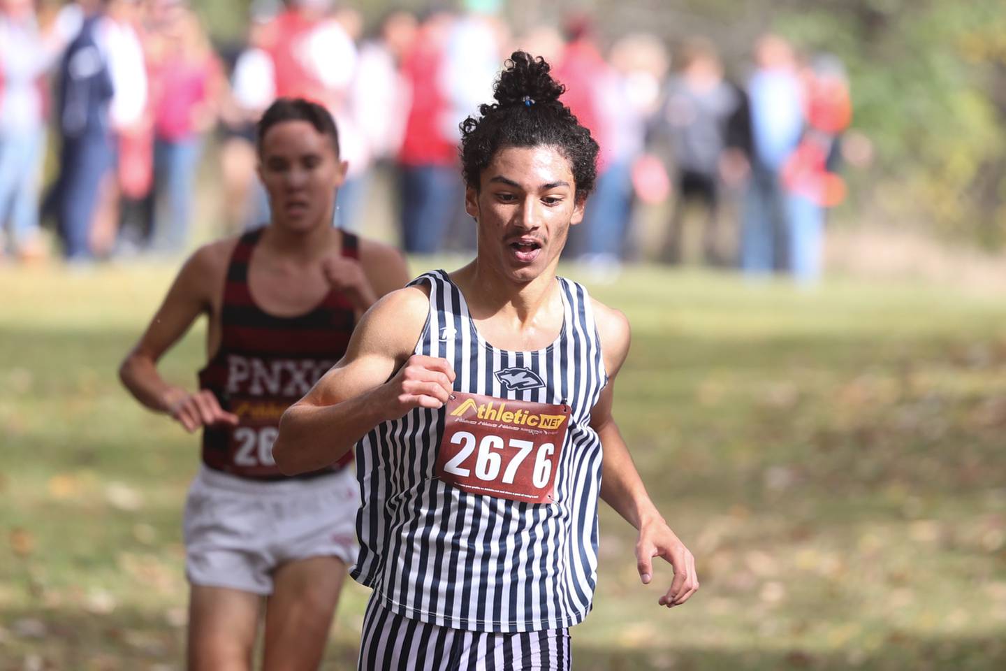Plainfield South’s Camyn Viger takes first in the Boys Cross Country Southwest Prairie Conference Championship at Channahon Community Park on Friday.