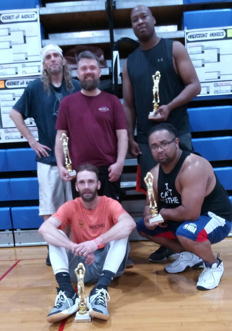 Eric Harris, Dustin Nelson, Maurile Bell, Drew Carskaden, and Larmar Lewis are members of the Hoopahollies, which went 23-1 and won the 40-and-older Coloma Township Park District Fall Basketball League.
