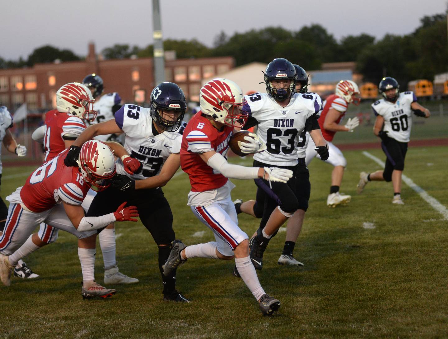 Oregon's Griffin Marlatt (6) runs an interception back against Dixon on Friday, Sept. 1, 2023 at Oregon High School's Landers-Loomis Field/