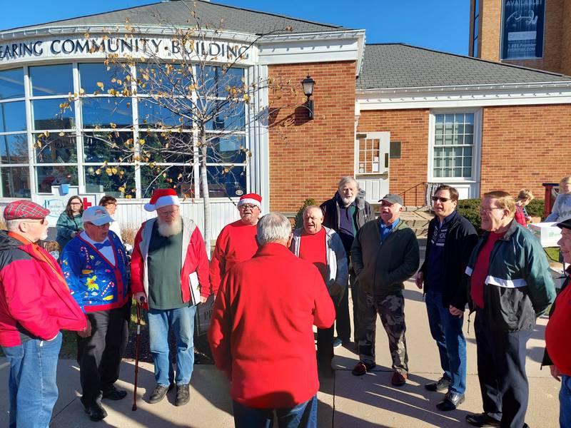 Carolers sang Christmas songs Saturday, Nov. 18, 2023, during the Christmas Walk in Princeton.