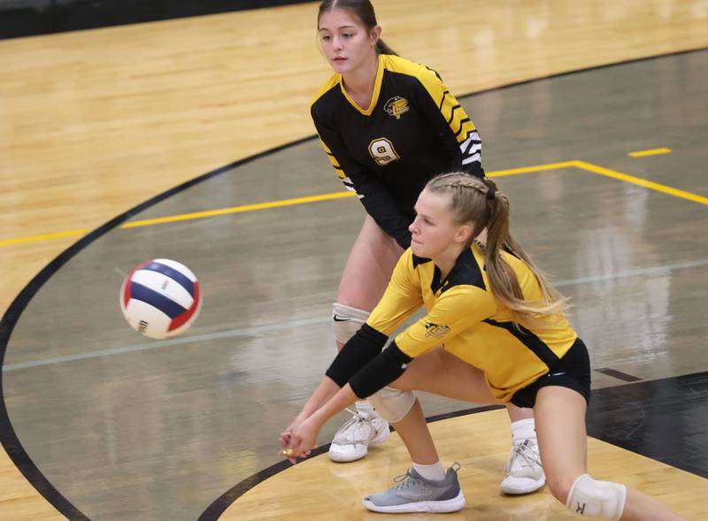Putnam County's Sarah Wiesbrock digs out a return as teammate Alexis Margis watches during the Class 1A Regional final on Thursday, Oct. 30, 2025 at Putnam County High School.