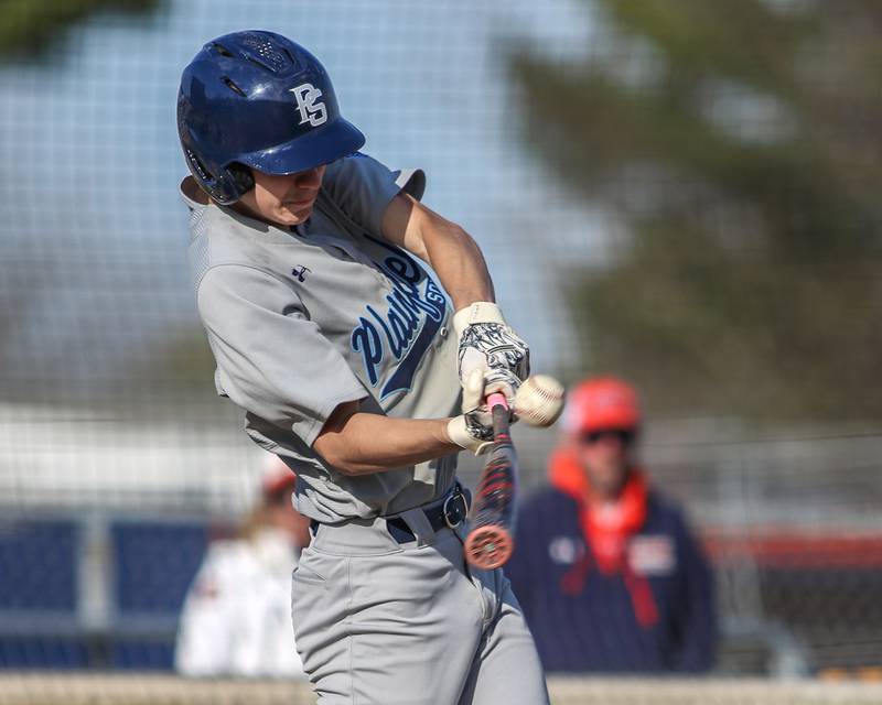 Plainfield South's Nicholas Ruenzi (21) swings at a pitch during baseball game between Plainfield South at Oswego on Monday, April 14, 2025 in Oswego.