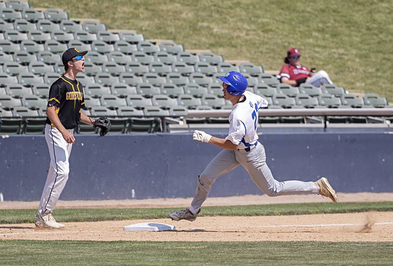 Newman’s Brendan Tunink rounds third for an inside the park home run against Goreville Saturday, June 3, 2023 during the IHSA class 1A third place baseball game.