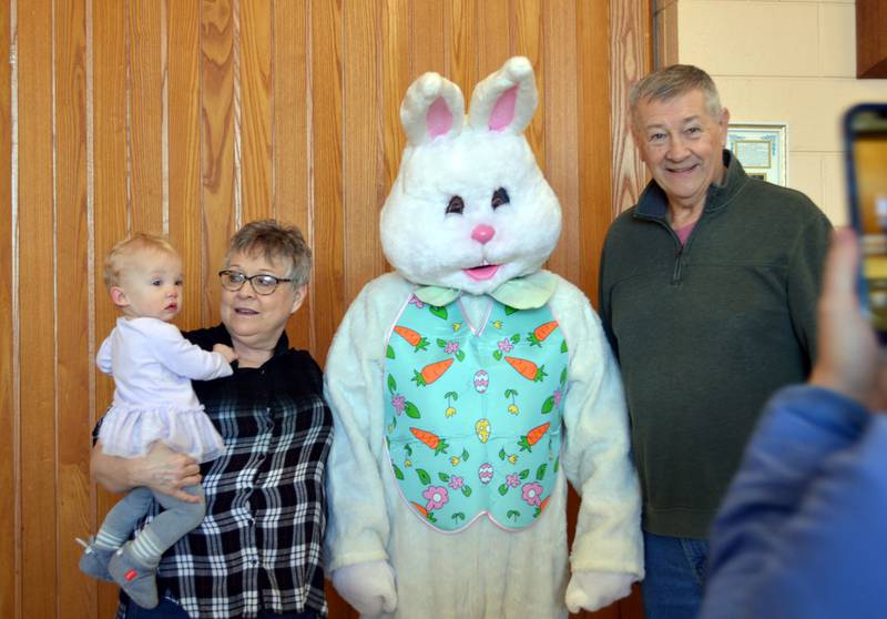 Randy and Cindy Reuter, of Oregon, pose for a picture with the Easter Bunny and granddaughter Ava Messer, 1, of Denver, Colorado, during the Leaf River Lion's annual Breakfast with Bunny in the Bertolet Memorial Building on April 16.