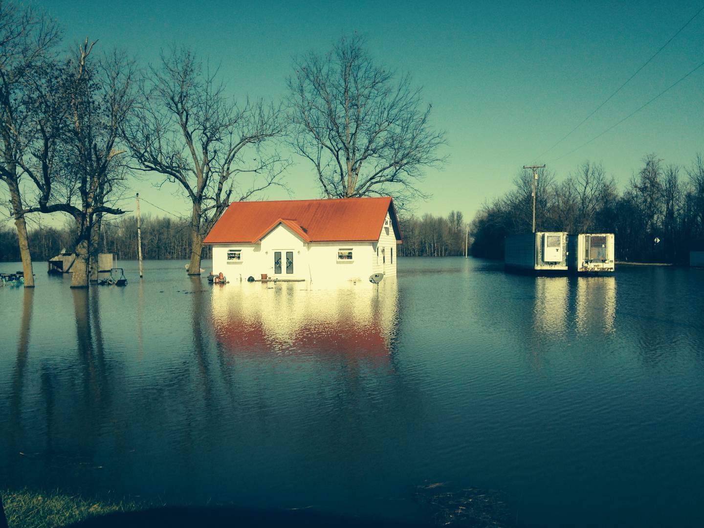 A house in Tamms that belonged to Brandy Renshaw’s uncle takes on floodwater in 2019.