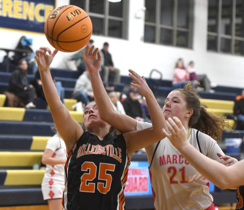 Milledgeville's Rylie Helms (25) and Polo's Reese Mekeel (21) reach for the ball on Saturday, Jan. 24, 2026 at Polo High School.