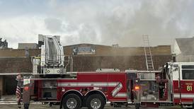 Fire that gutted 2 downtown McHenry shops started from roofing torch, caused 2 injuries: official report