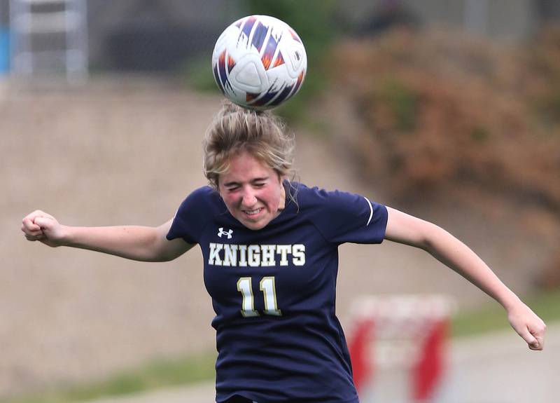 IC Catholic Prep's Alysa Lawton heads the ball to the Pleasant Plains end of the pitch during the IHSA Class 1A state girls soccer third place game Saturday, May 27, 2023, at North Central College in Naperville.