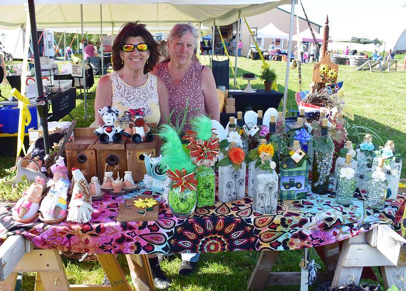 Representatives of Dee’s Crafts, show off their goods Saturday, May 10, 2025, at P&C Little Rascals’ open house.