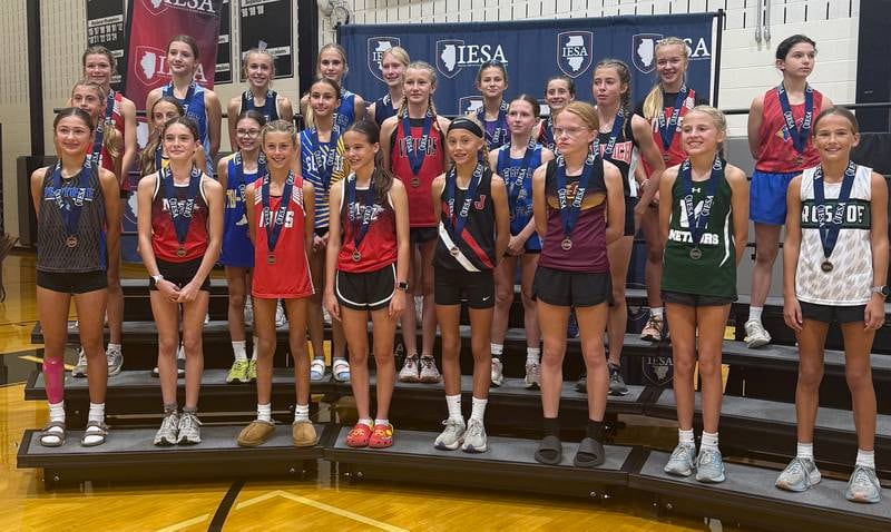 Dixon’s Brynleigh Davis (back row third from left) took 24th in the girls 3A race