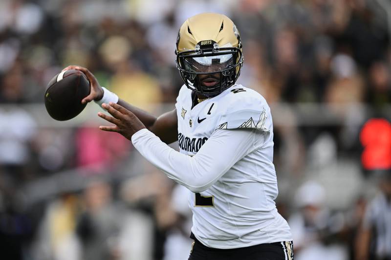FILE - Colorado quarterback Shedeur Sanders (2) throws a pass against Central Florida during the first half of an NCAA college football game, Saturday, Sept. 28, 2024, in Orlando, Fla. (AP Photo/Phelan M. Ebenhack, File)